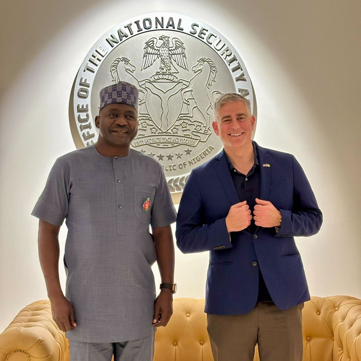 Rep. Michael Baumgartner, right, poses for a photo with Nigerian Minister of Defense Gen. Christopher Gwabin Musa on Saturday in Abuja, Nigeria.  (Courtesy of Rep. Michael Baumgartner via X)