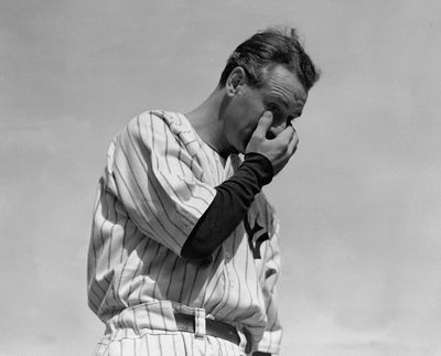 New York Yankees’ Lou Gehrig wipes away a tear while speaking during a sold-out tribute at Yankee Stadium in New York on July 4, 1939. Major League Baseball will hold its first Lou Gehrig Day on Wednesday.  (Associated Press)