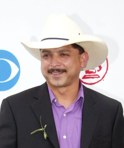 In this Sept. 3, 2003, file photo, Emilio Navaira arrives at the Latin Grammy Awards in Miami. The Grammy-winning Tejano star has died in New Braunfels, Texas. He was 53. (Wilfredo Lee / Associated Press)