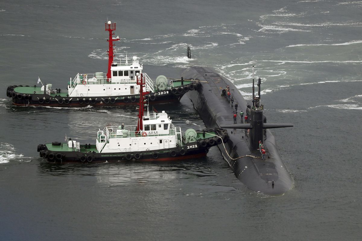 The nuclear-powered submarine USS Michigan approaches to join the U.S. aircraft carrier USS Carl Vinson in drills near the Korean Peninsula, at Busan port in Busan, South Korea, Tuesday, April 25, 2017. North Korea marks the founding anniversary of its military on Tuesday, and South Korea and its allies are bracing for the possibility that it could conduct another nuclear test or launch an intercontinental ballistic missile for the first time. (Jo Jung-ho / AP)