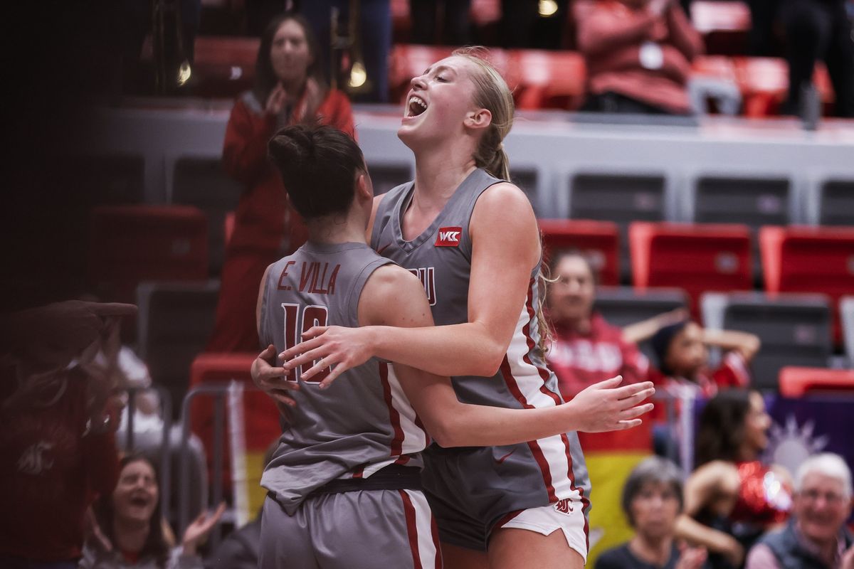 Washington State players Eleonora Villa and Tara Wallack celebrate after the Cougars defeated Utah Valley in the second round of the WNIT on Monday in Pullman. (Courtesy of WSU Athletics)