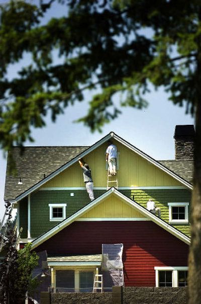 
Dozens of colors decorate the upscale homes at Mill River, a development along the Spokane River on the western edge of Coeur d'Alene. 
 (Jed Conklin / The Spokesman-Review)
