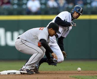 
Seattle's Ichiro Suzuki steals second base before Baltimore shortstop Luis Hernandez can grab the ball. Associated Press
 (Associated Press / The Spokesman-Review)