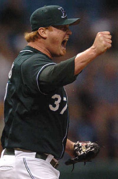 
Devil Rays  Seth McClung reacts to the final out of a 7-6 win. 
 (Associated Press / The Spokesman-Review)