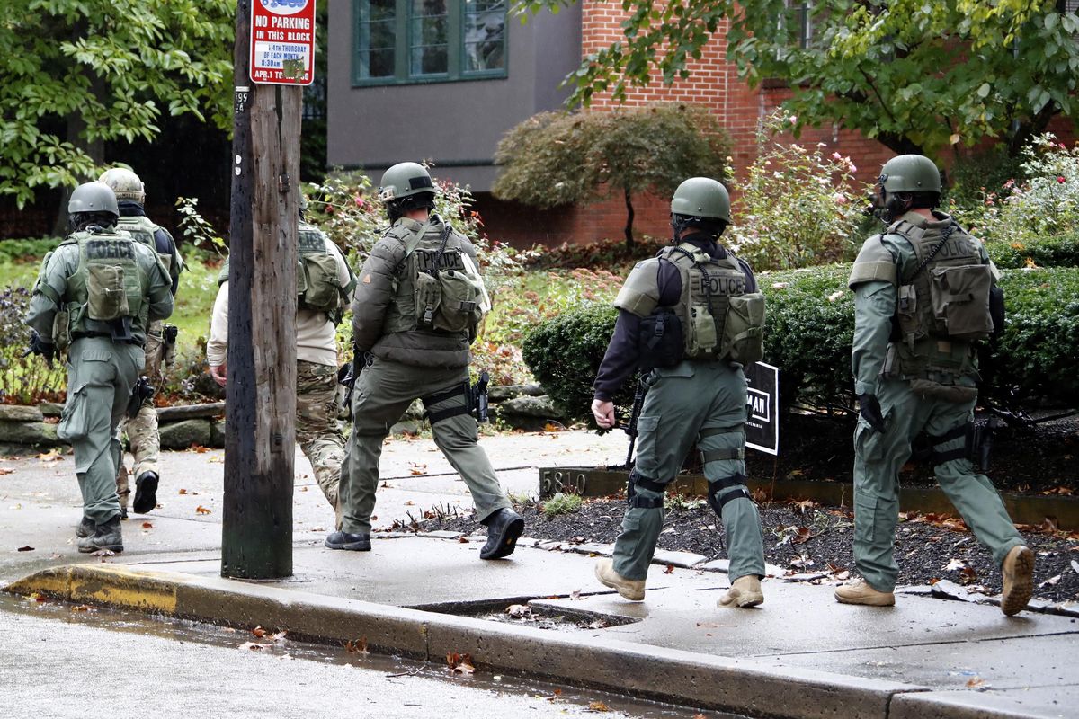 A SWAT team arrives at the Tree of Life Synagogue inPittsburgh, Pa. where a shooter opened fire injuring multiple people, Saturday, Oct. 27, 2018. (Gene J. Puskar / Associated Press)