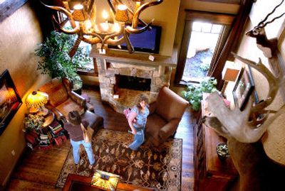 
Shannah Wicks, right, and Sally Sale, both from Spokane, walk through the den of the Aspen Creek Lodge at the 2006 Street of Dreams. 
 (File/ / The Spokesman-Review)