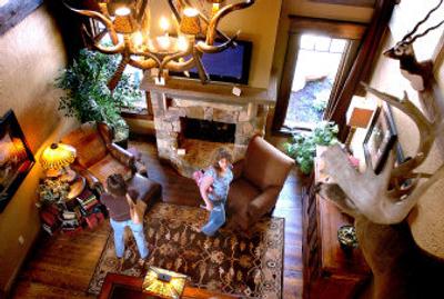 
Shannah Wicks, right, and Sally Sale, both from Spokane, walk through the den of the Aspen Creek Lodge at the 2006 Street of Dreams. 
 (File/ / The Spokesman-Review)