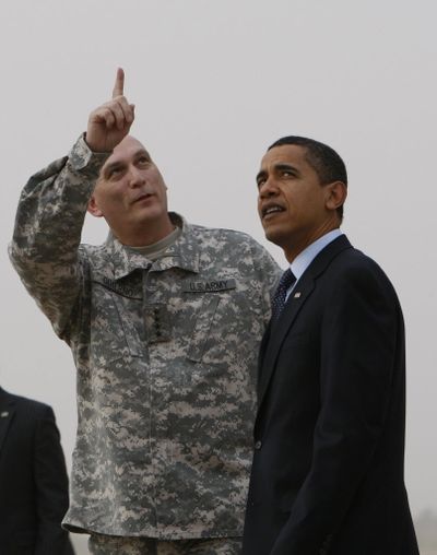 President Barack Obama is greeted by Gen. Ray Odierno, the top U.S. commander in Iraq, as he arrives in Baghdad, Iraq, on Tuesday, April 7, 2009. (Associated Press)