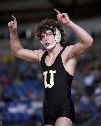 University’s Jake Mason celebrates winning the state title at 160 pounds. Mason beat Snohomish’s Micah Morrill 7-6 for his second state championship.Special to  (Patrick Hagerty Special to)