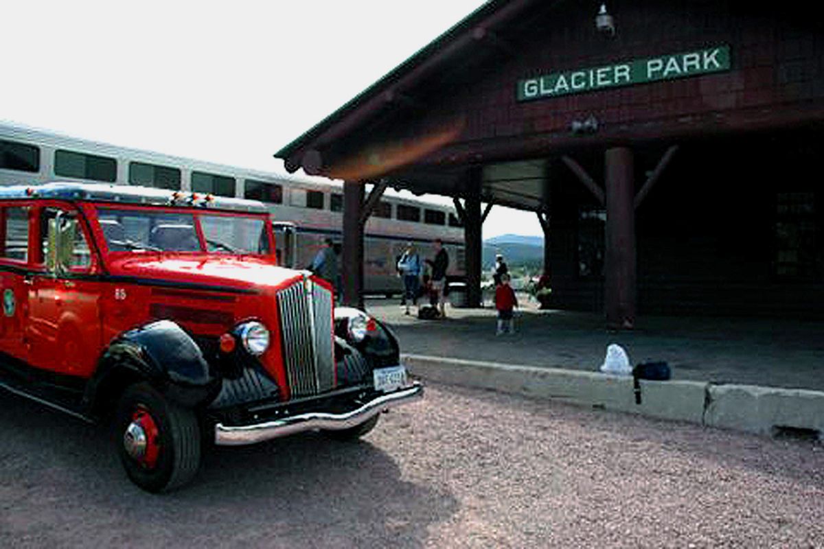 A Red Bus transports visitors from the Amtrac Station located in the town of East Glacier to Glacier National Park Lodge at Two Medicine. (Mike Brodwater/For The Spokesman-Review)