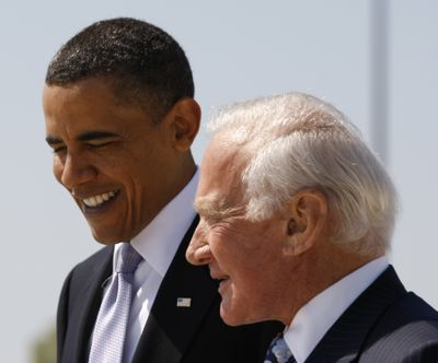 President Barack Obama talks with Apollo 11 astronaut Buzz Aldrin  on Thursday.  (Associated Press)