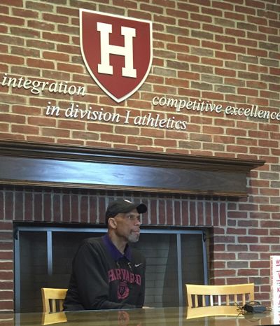 Basketball Hall of Famer Kareem Abdul-Jabbar speaks with reporters on Saturday, Oct. 29, 2016, at Harvard before meeting with the Crimson men's basketball team in Cambridge, Mass. The NBA Hall of Famer has a new book of essays in which he expresses his concern about the divisive political climate. (Jimmy Golen / Associated Press)