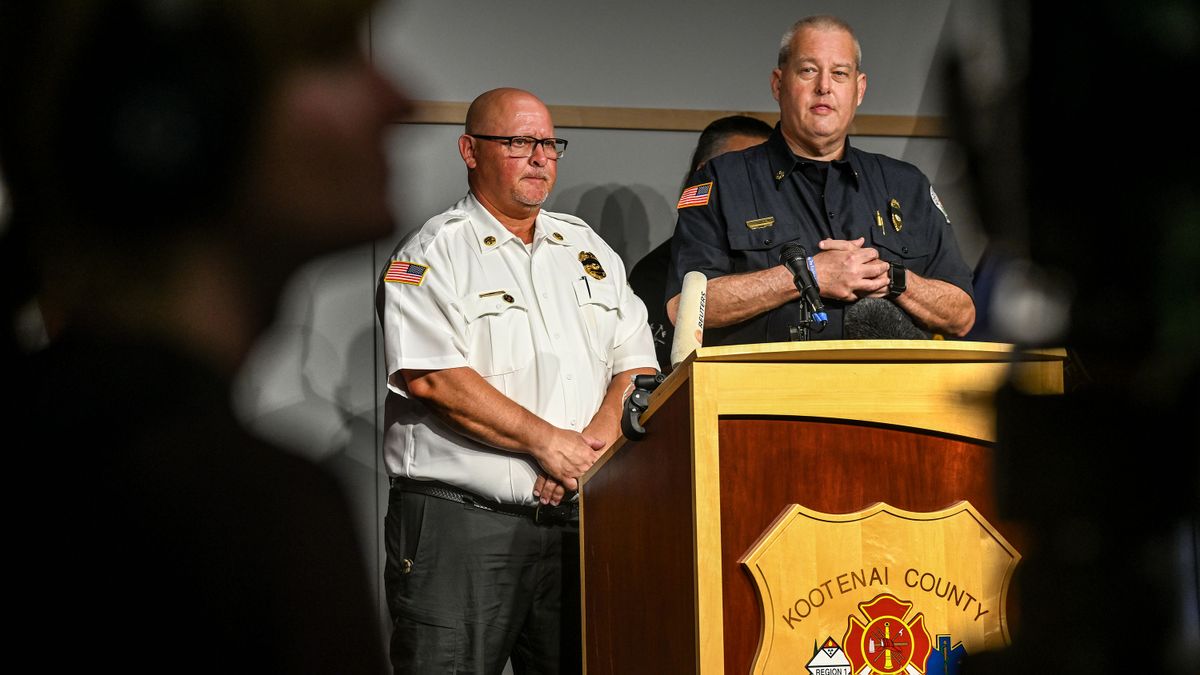 Coeur d’Alene Fire Chief Tom Greif, left, and Kootenai County Fire & Rescue Chief Chris Way address media Monday at a news conference regarding the two firefighters who were killed during Sunday’s ambush. Battalion Chief Frank Harwood, a husband, father and a veteran, was with the department for 17 years. Coeur d’Alene Fire Department lost Battalion Chief John Morrison, 52, who was with the department for almost 29 years. (Kathy Plonka/The Spokesman-Review)