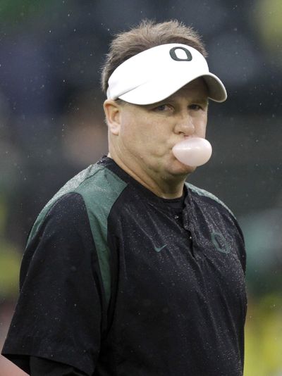 Chip Kelly will continue to blow bubbles on the Oregon Ducks sideline after passing up a job in the NFL. (Associated Press)