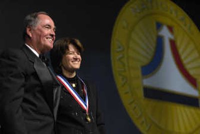 
Sally Ride is presented a medal symbolizing her induction into the Aviation Hall of Fame by Robert Crippen on Saturday. Associated Press
 (Associated Press / The Spokesman-Review)