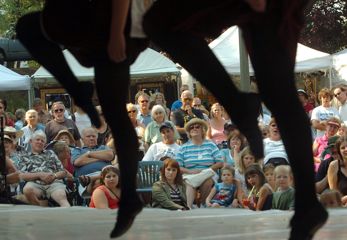The crowd at Art on the Green watches Irish dancers at the on the mainstage at North Idaho College in Coeur d’Alene in this 2006 file photo. Art on the Green, Taste of the Coeur d’Alenes and the Downtown Street Fair start Friday. (File / The Spokesman-Review)