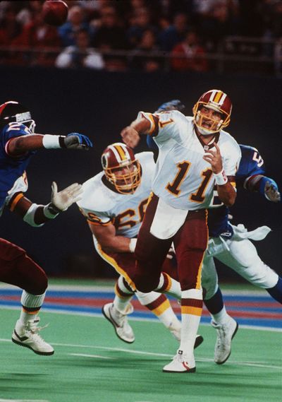 Former Redskins quarterback Mark Rypien of Spokane is among 126 players suing the NFL for traumatic head injuries.