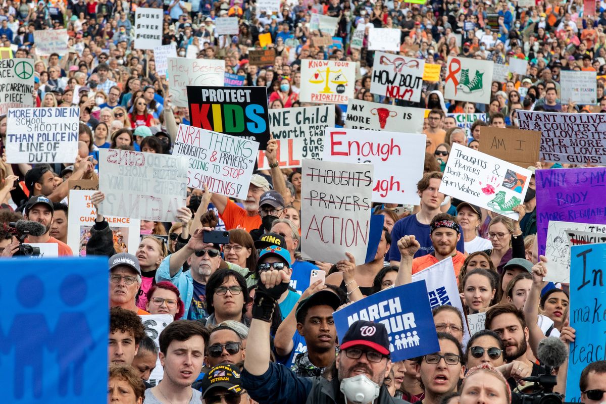 Crowds with signs gather at the March for our Lives rally against gun violence at the National Mall in Washington, D.C., on June 11, 2022. MUST CREDIT: Photo for The Washington Post by Amanda Andrade-Rhoades.  (Amanda Andrade-Rhoades/For The Washington Post)