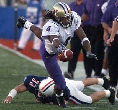 
UW coach Keith Gilbertson will probably stick with Casey Paus as the starting quarterback Saturday against UCLA.  
 (File/Associated Press / The Spokesman-Review)