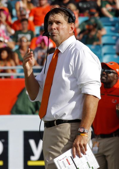 Miami head coach Al Golden looks on in the second half of play against Virginia Tech in an NCAA college football game, Saturday, Oct. 17, 2015, in Miami Gardens, Fla. Golden was fired on Sunday. (Joe Skipper / Associated Press)
