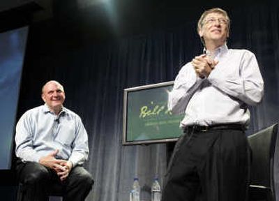 
Microsoft Chairman Bill Gates, right, speaks to employees as CEO Steve Ballmer looks on, during a farewell event celebrating Gates' years at Microsoft.Associated Press
 (Associated Press / The Spokesman-Review)
