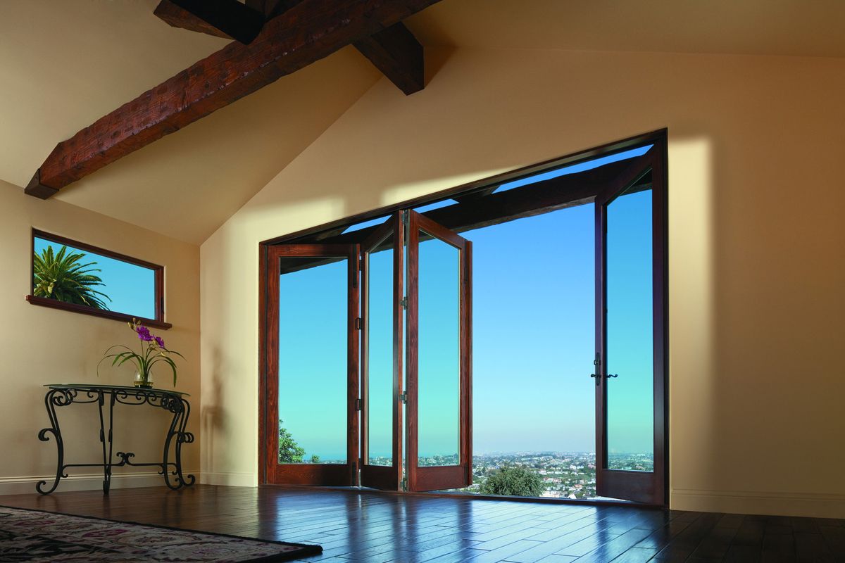 Andersen ArcA folding patio door is part of manufacturer Andersen’s line of architectural patio doors that come in custom sizes up to 48 feet wide and 10 feet tall.