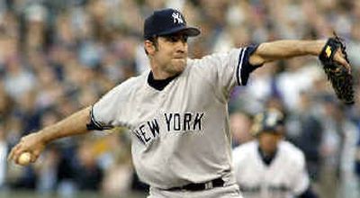 
New York Yankees starting pitcher Mike Mussina throws in the first inning against the Mariners.New York Yankees starting pitcher Mike Mussina throws in the first inning against the Mariners.
 (Associated PressAssociated Press / The Spokesman-Review)