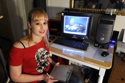 Cristie Dunavan, shown at home, is an artist who combines sketching and painting with computer manipulation. She will be part of a Halloween night show at Ink to Media. (Jesse Tinsley / The Spokesman-Review)
