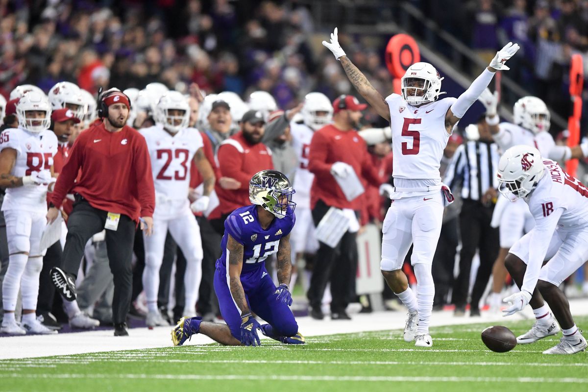 Washington State cornerback Derrick Langford Jr. (5) reacts after breaking up a pass intended for Washington wide receiver Ja
