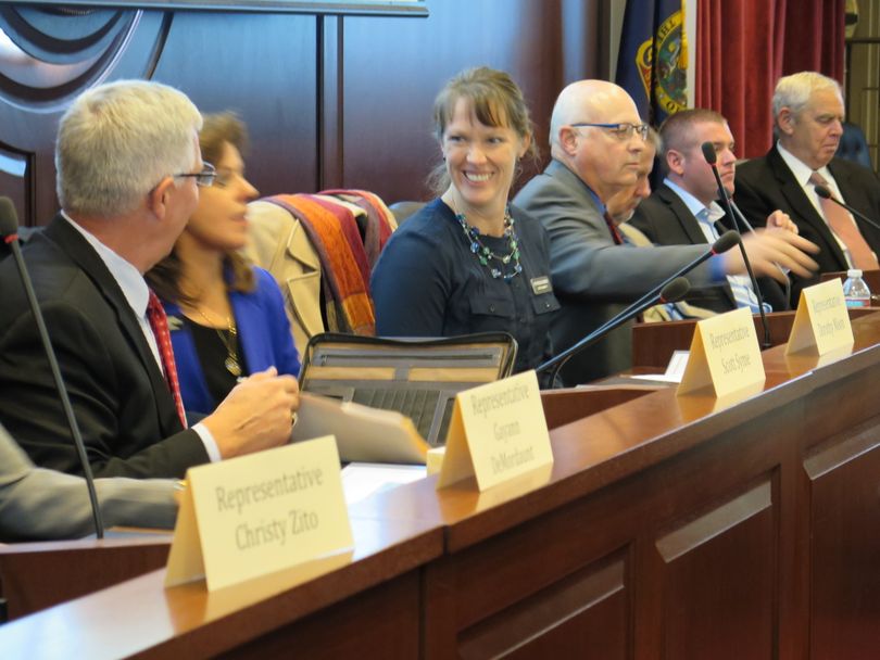 New Rep. Priscilla Giddings, center, talks with other new Idaho lawmakers during a break in orientation sessions at the state Capitol on Monday. (Betsy Z. Russell)