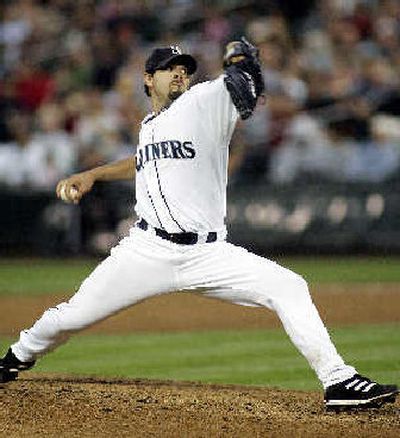 
Joel Pineiro throws during the sixth inning against the Minnesota Twins.
 (Associated Press / The Spokesman-Review)
