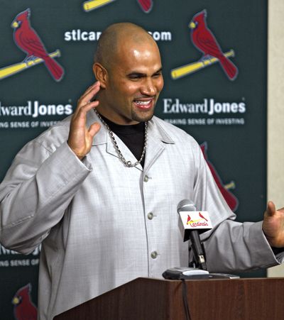 St. Louis’ Albert Pujols became the 25th multiple MVP award winner.  (Associated Press / The Spokesman-Review)