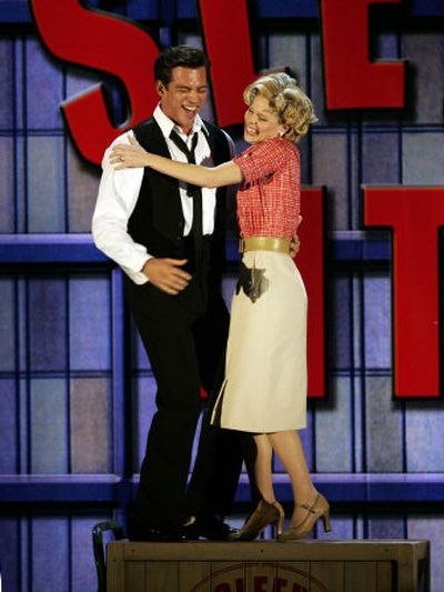 
Harry Connick, Jr., left, and Kelli O'Hara perform a song from 