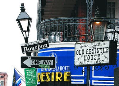 
Street signs on Bourbon Street may be a little tipsy in the French Quarter of New Orleans, but things are not the same as they used to be. 
 (The Spokesman-Review)