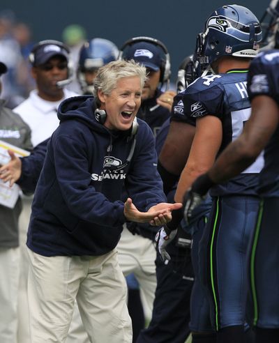 Pete Carroll thanks his defense for holding 49ers on fourth-and-1 last Sunday. (Associated Press)