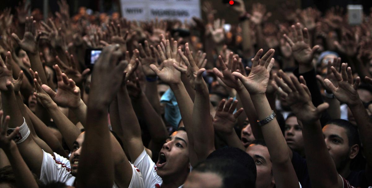 Egyptian protesters chant anti-U.S. slogans in front of the U.S. Embassy in Cairo on Tuesday. (Associated Press)