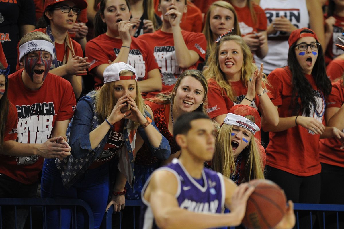 Gonzaga’s student section unleashes a barrage of commotion as Portland’s Bryce Pressley tries to inbound the ball Feb. 5 in Spokane. (Colin Mulvany)
