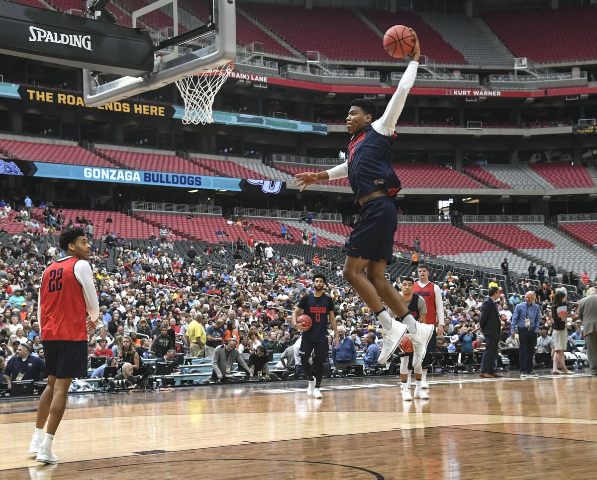Gonzaga’s Rui Hachimura glides through the air and dunks during practice at the Final Four. (Dan Pelle / The Spokesman-Review)