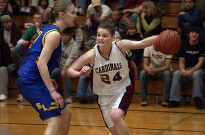 
North Idaho's Caitlin Courchaine No. 24 drives the baseline against an opponent in a March game at North Idaho College. Courchaine will attend and play basketball at Carroll College this fall.
 (File / The Spokesman-Review)