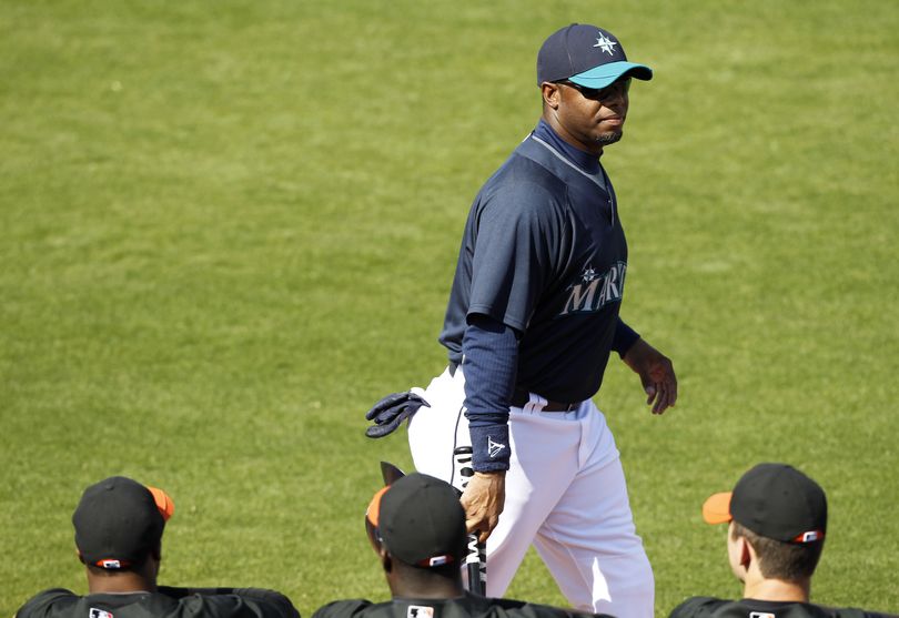 Seattle Mariners' Ken Griffey Jr. walks off the field after playing in a spring training baseball game against the San Francisco Giants, Wednesday, March 3, 2010, in Peoria, Ariz. (Charlie Neibergall / Associated Press)