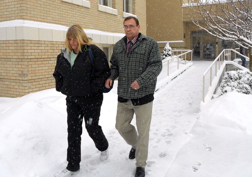 Jonathan Wade Ellington and his girlfriend leave Kootenai County District Court during a break in the opening day of his murder trial on Thursday for a 2006 road rage incident. (Meghann Cuniff / The Spokesman-Review)