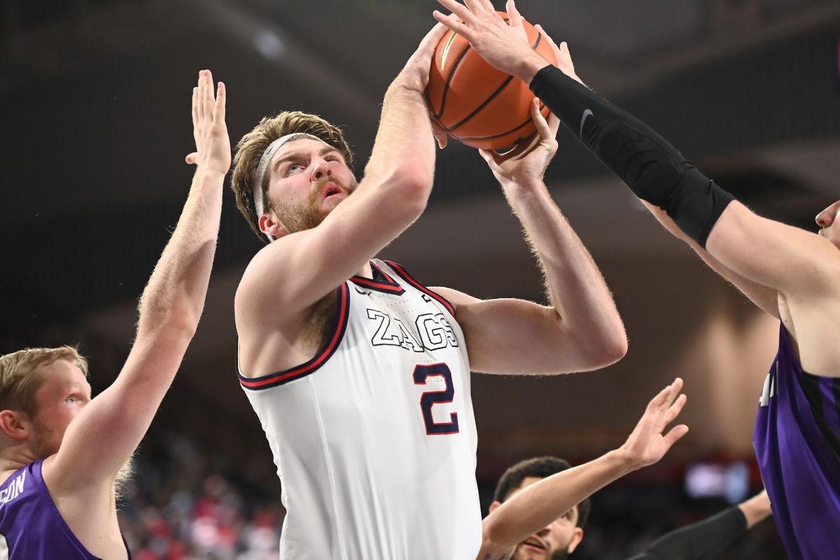 Gonzaga forward Drew Timme, battling in the paint against visiting Portland on Jan. 29, has connected on nearly 64% of his shots inside the arc during his career.  (Tyler Tjomsland / The Spokesman-Review)