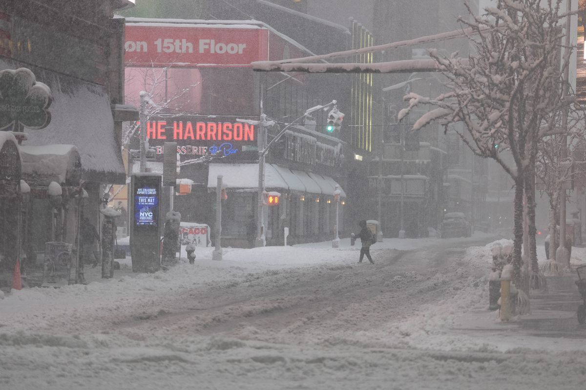 Snow piles up in Times Square during a blizzard Monday, Feb. 23, 2026, in Manhattan, New York.   (Barry Williams/New York Daily News/TNS)