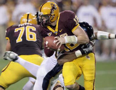Associated Press ASU and Rudy Carpenter (12) will face even more pressure this week when they travel to Eugene to face Oregon.
(Associated Press / The Spokesman-Review)