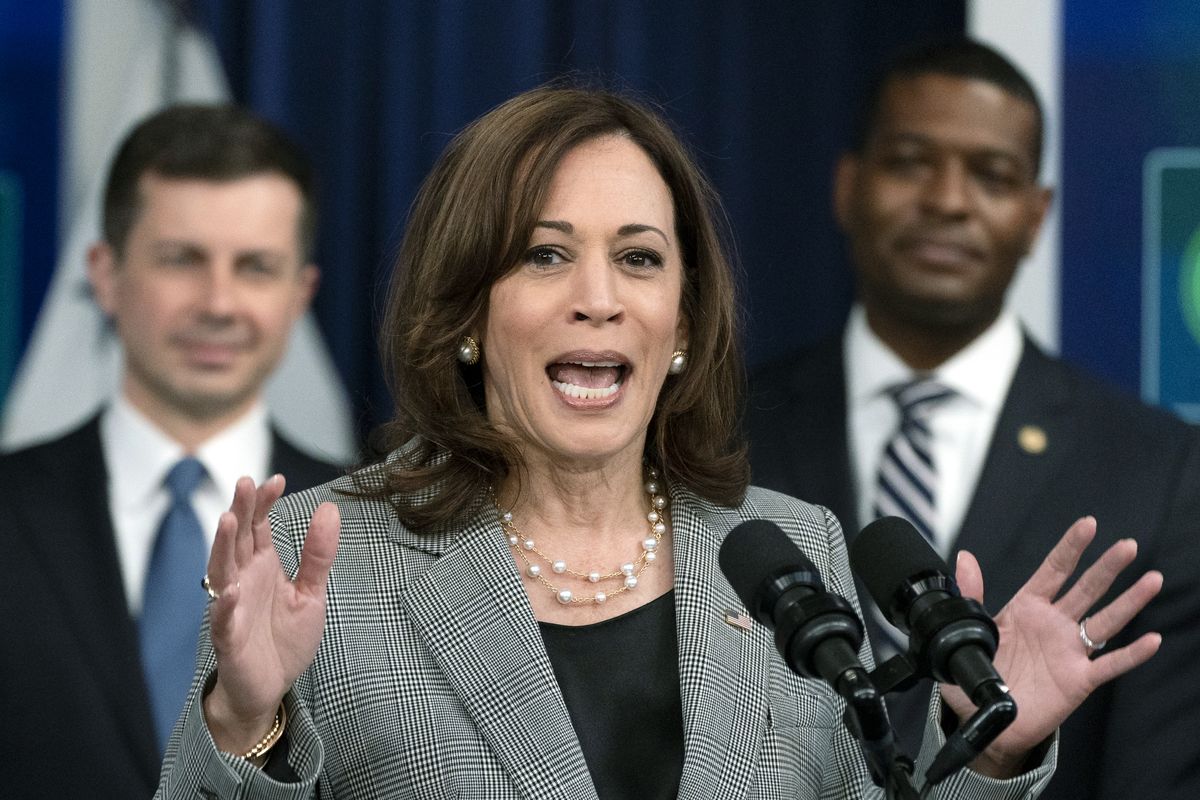 Vice President Kamala Harris with Secretary of Transportation Pete Buttigieg, left, and Administrator of the Environmental Protection Agency Michael Regan, right, announces major federal actions that will expand clean public transit and school buses, reduce emissions from diesel trucks, and create good-paying jobs, at the Eisenhower Executive Office Building on the White House complex, in Washington, Monday, March 7, 2022.  (Manuel Balce Ceneta)