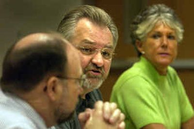
Kootenai County Commissioner Gus Johnson, center, opened a planning meeting Thursday with a call for an informational meeting about the leaking BNSF Railway Co. refueling depot near Hauser. 
 (Jesse Tinsley / The Spokesman-Review)
