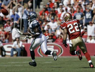 
Seattle's Deion Branch, left, has been among the NFL's top receivers the last three weeks with 20 catches. Associated Press
 (Associated Press / The Spokesman-Review)