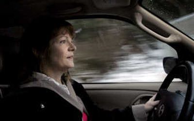 
Eileen Mouzoon, of Hayden Lake, talks about her first winter in North Idaho while driving to volunteer at the local hospice office last month. 
 (Kathy Plonka / The Spokesman-Review)