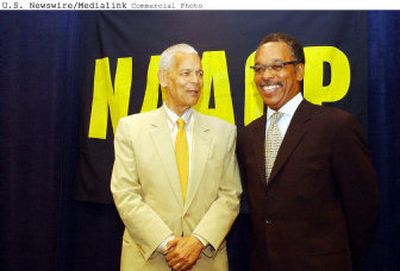
Newly selected NAACP president Bruce Gordon, right, lauded the leadership and passion of NAACP Chairman Julian Bond. 
 (Kent D. Johnson photo / The Spokesman-Review)