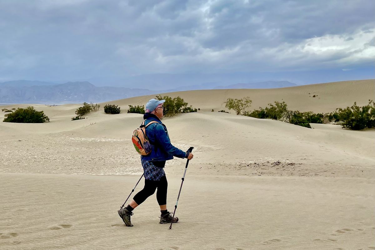 Walking amid the desert at Mesquite Flat Sand Dunes in Death Valley National Park. (John Nelson)